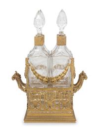 A French Gilt Metal and Glass Four-Bottle Decanter Caddy