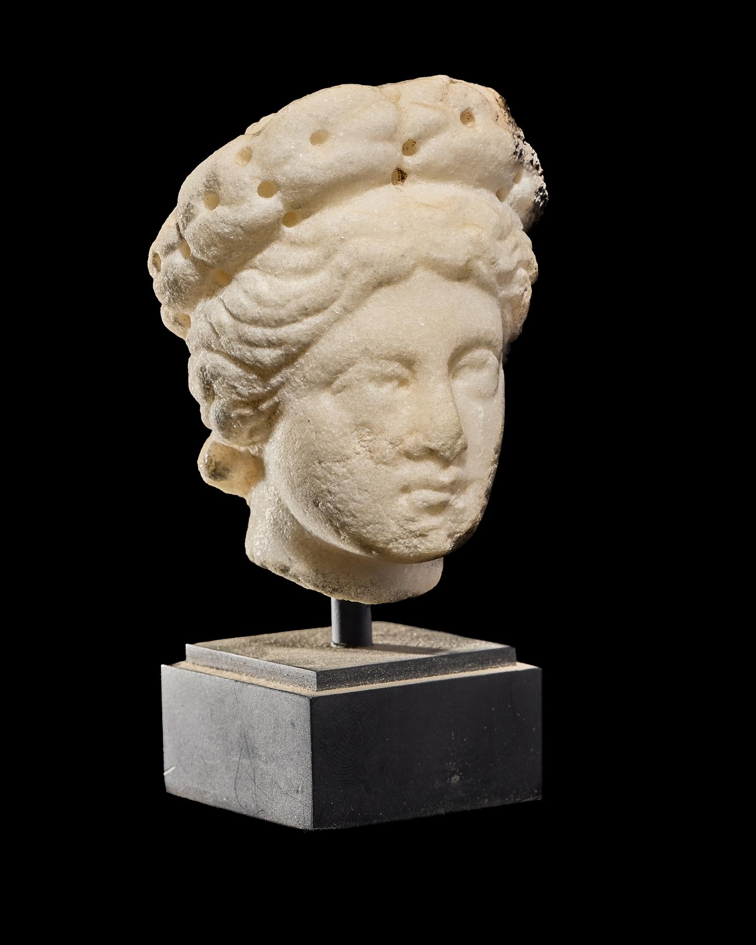 A Roman Marble Head of a Woman