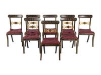 A Set of Eight Regency Black-Painted and Parcel-Gilt Dining Chairs