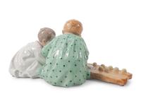 A Meissen Porcelain Figural Group of Children Playing in Sand