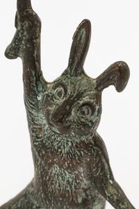 A Pair of Patinated Cast Metal Rabbit Candlesticks