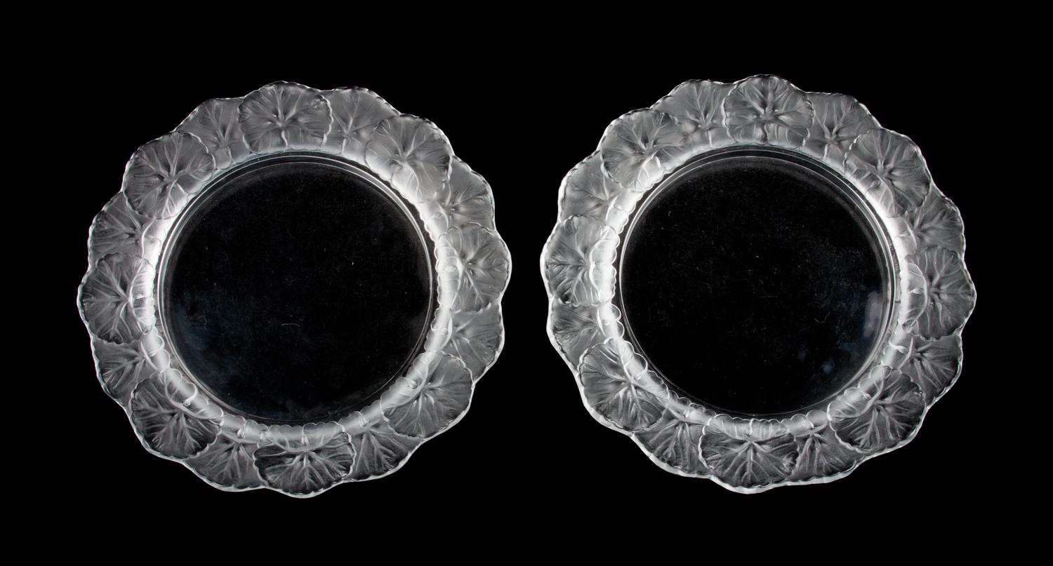 A Set of Eight Lalique Molded and Frosted Glass Salad Plates Diameter 8 1/2 inches.