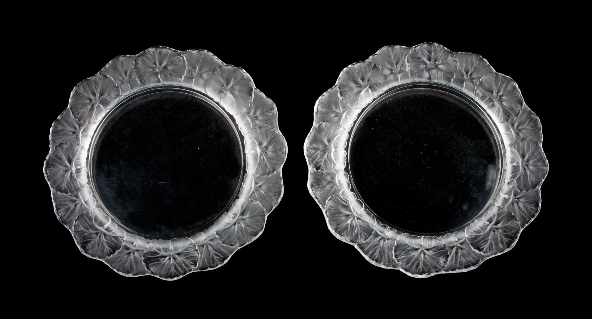 A Set of Eight Lalique Molded and Frosted Glass Salad Plates Diameter 8 1/2 inches.