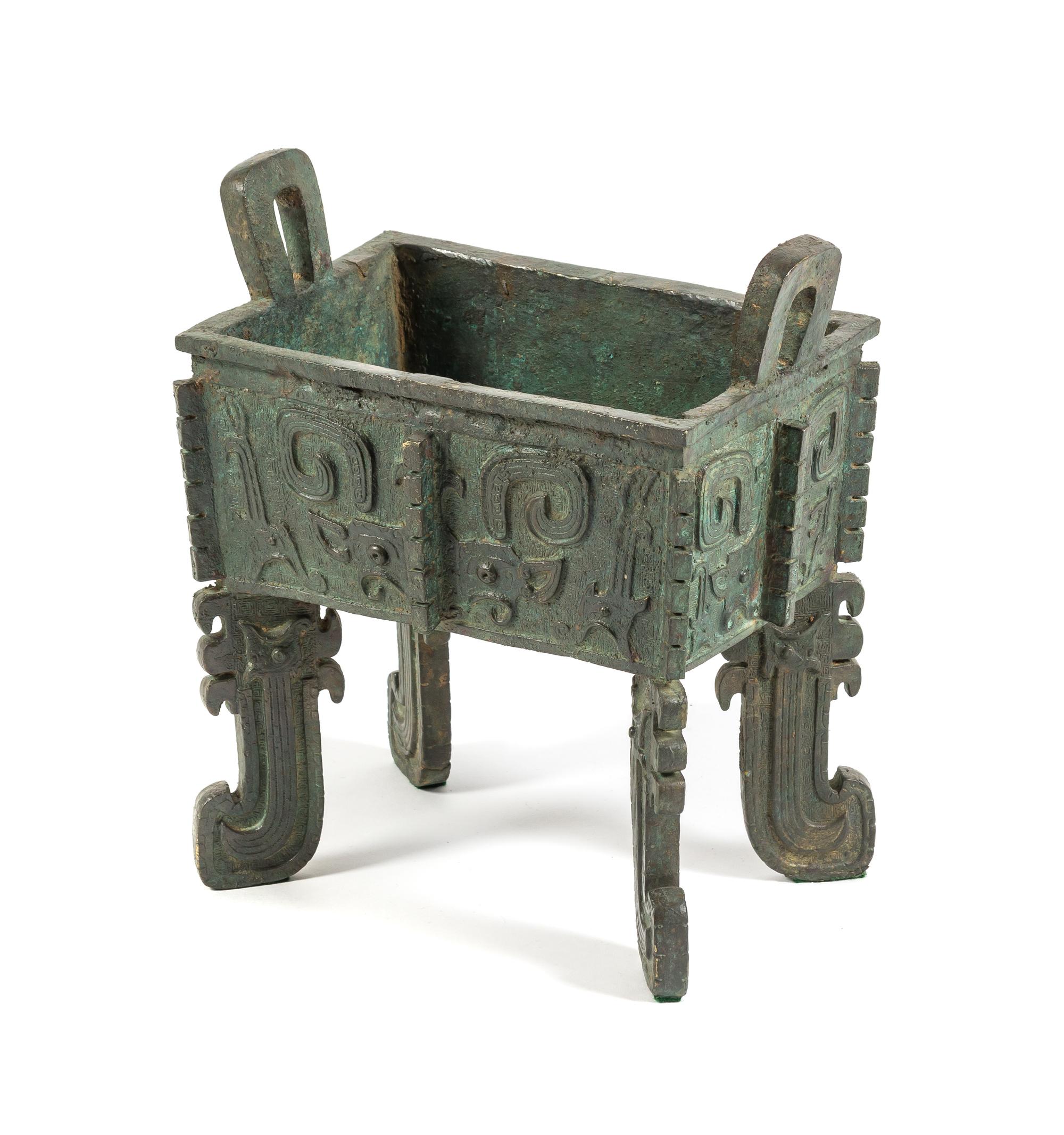 A Bronze Archaistic Fang Ding Height 12 1/8 inches.