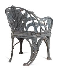 A Set of Four English Cast Iron Garden Chairs
