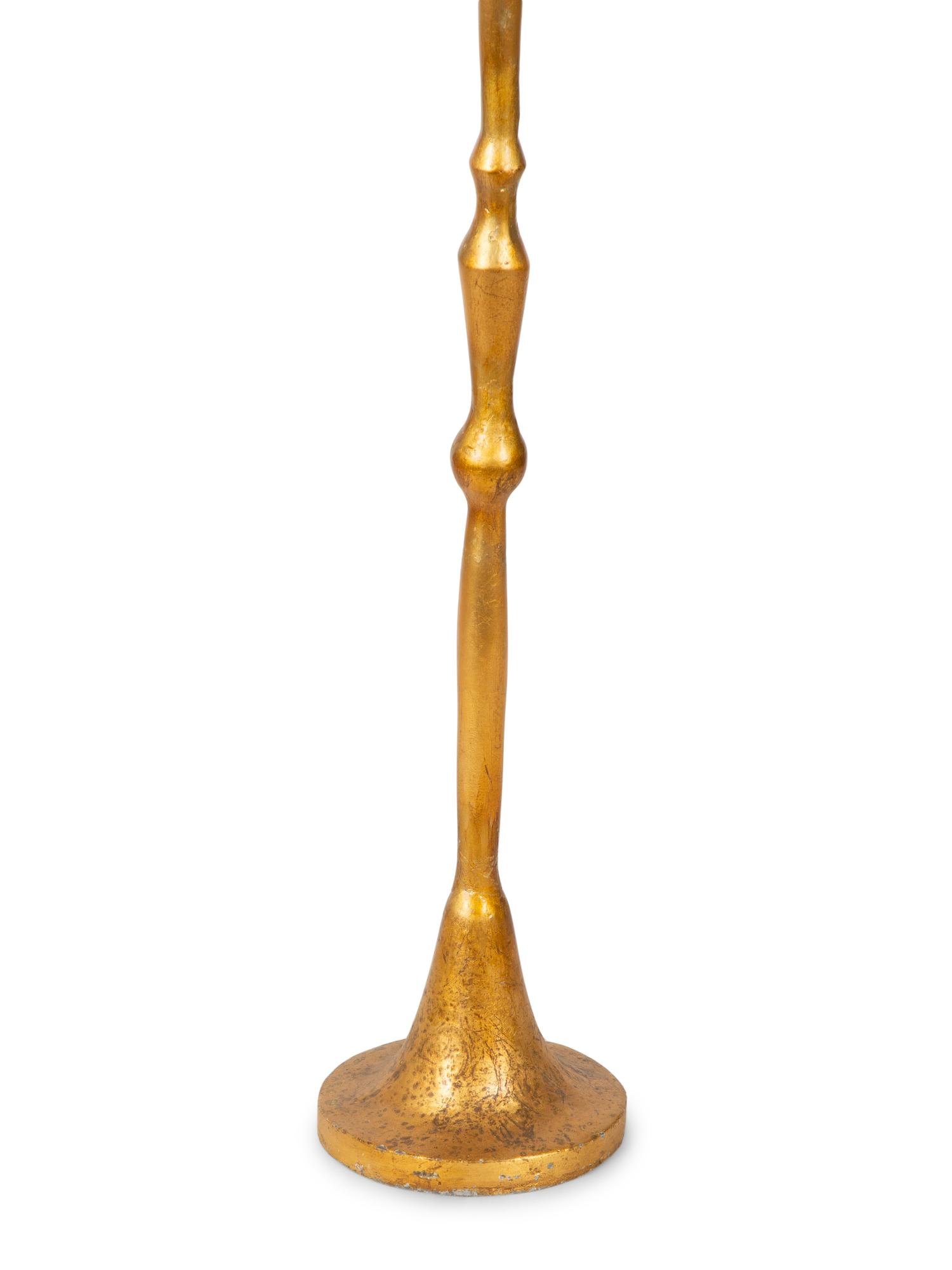 A Gilt Lead Floor Lamp — CIRCA 1930