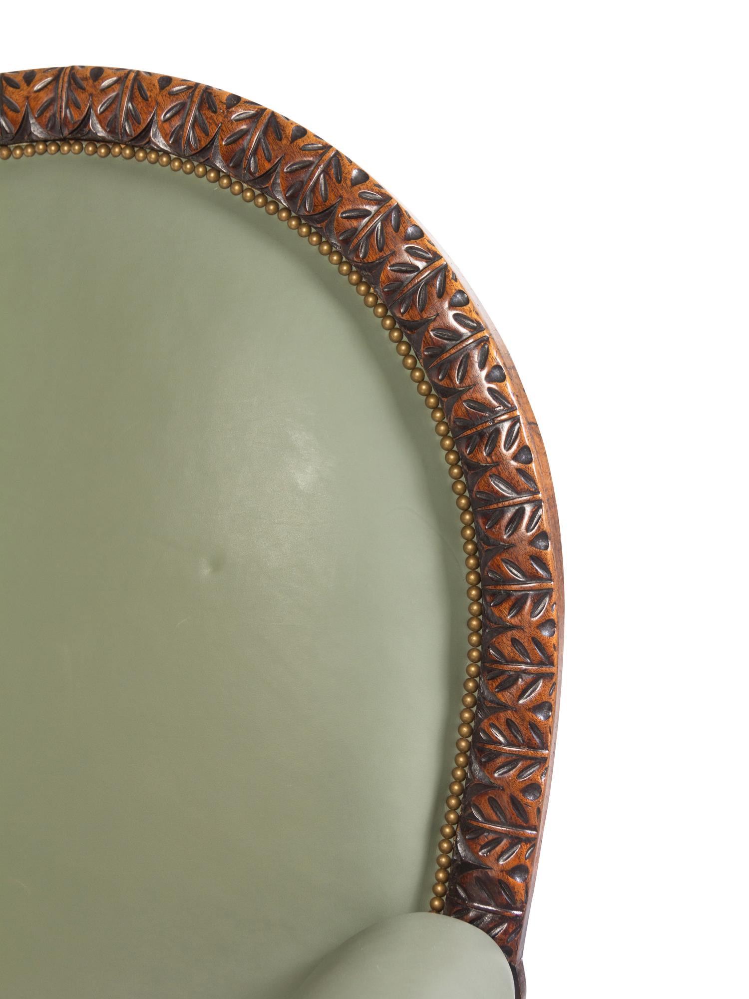 An Italian Carved Walnut Armchair
