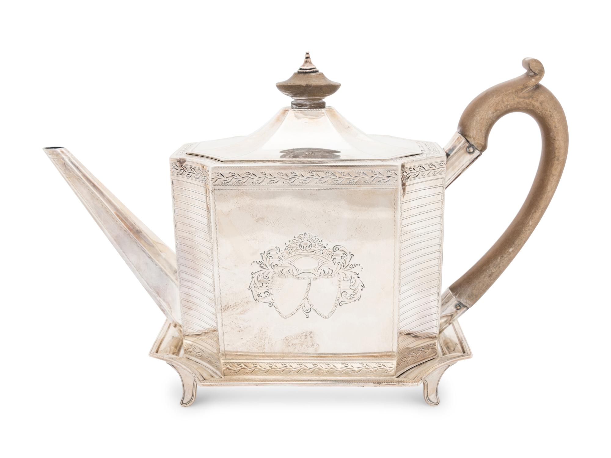 An English George III Silver Teapot and Stand