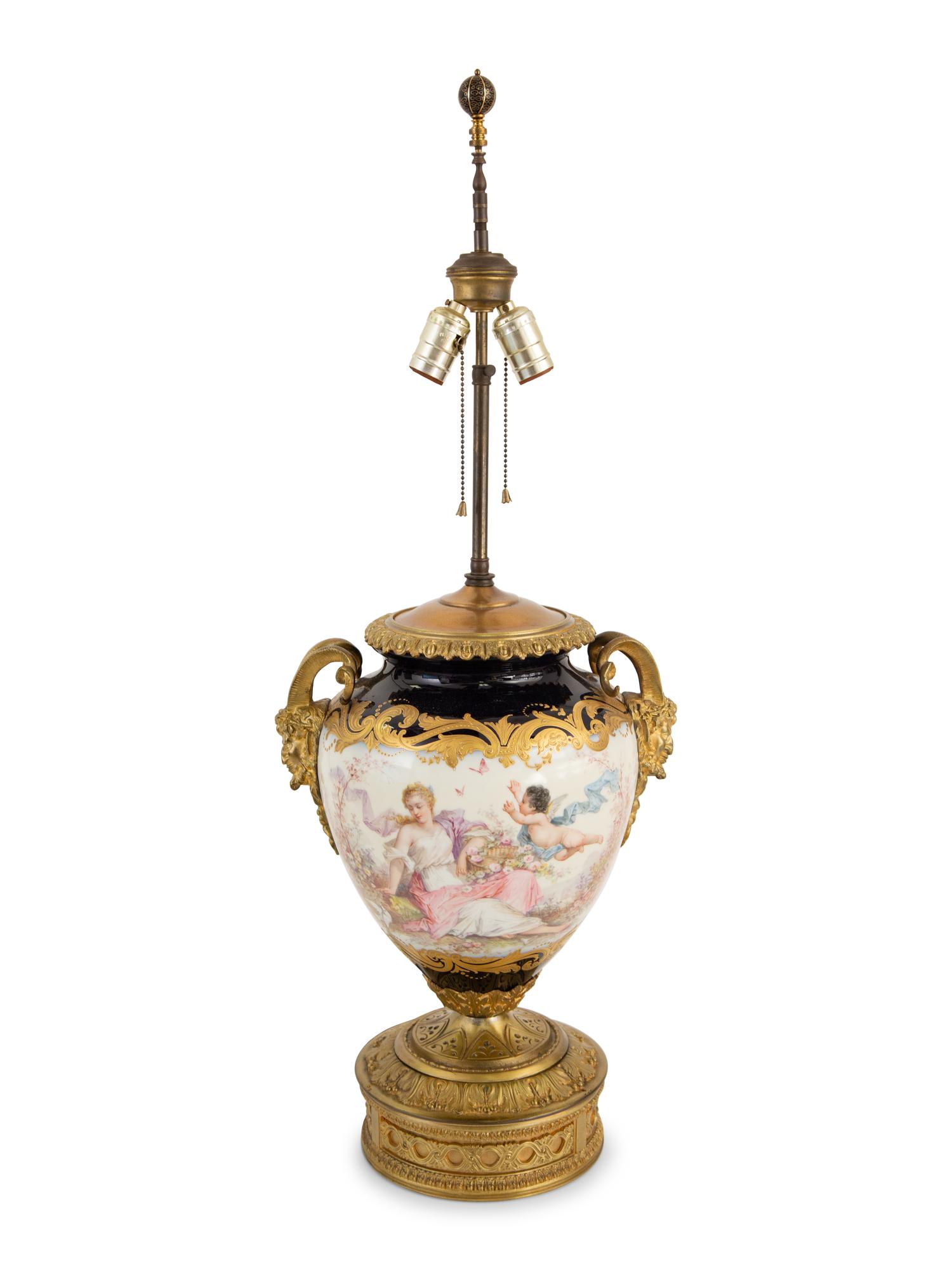 A Gilt Metal and Sèvres Style Porcelain Urn Mounted as a Lamp