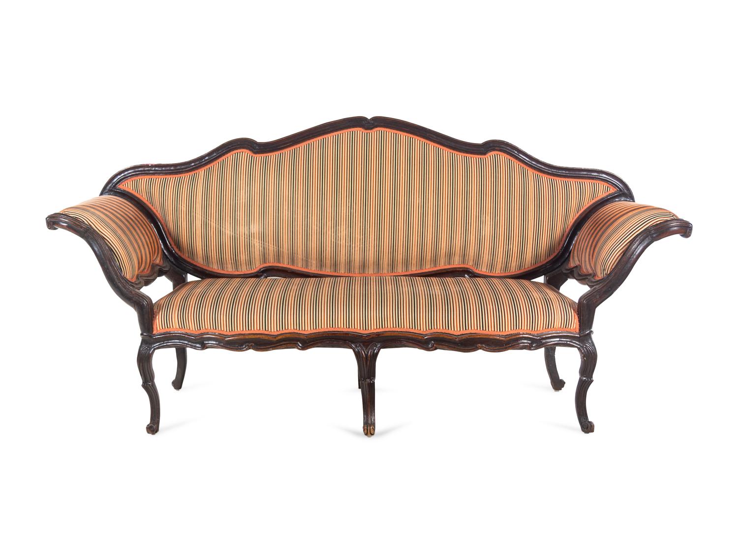 An Italian Carved Walnut Settee