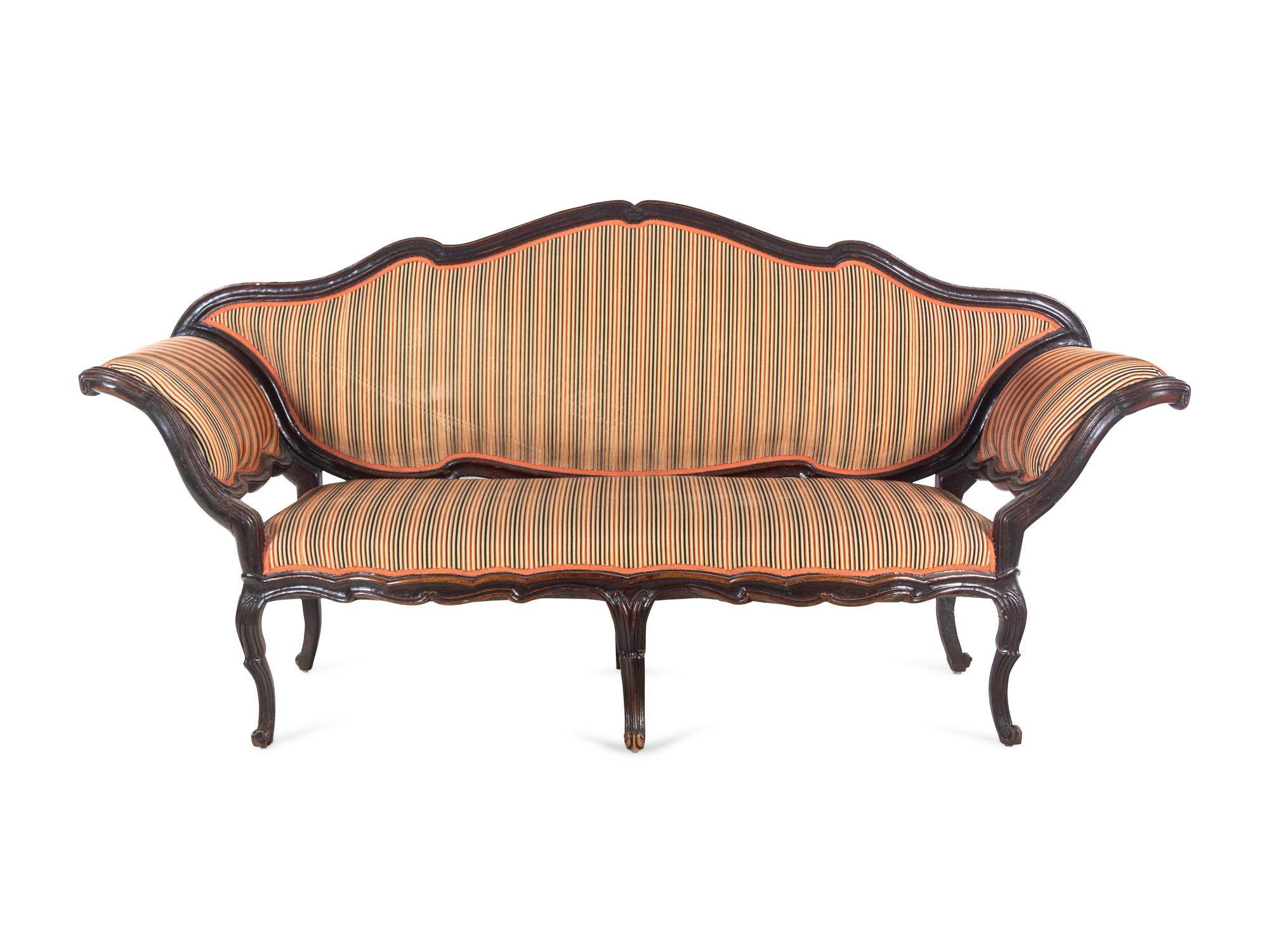 An Italian Carved Walnut Settee