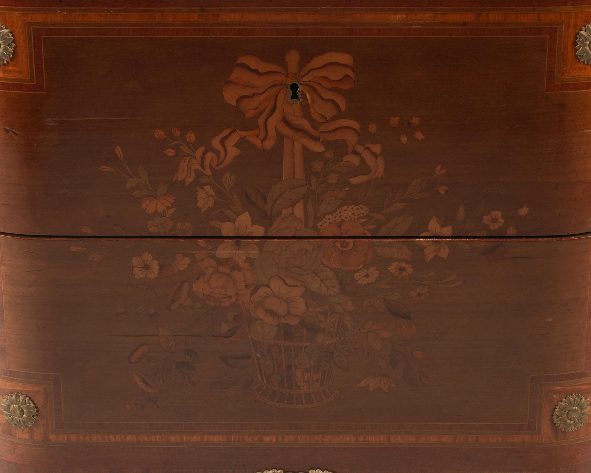 A Louis XVI Style Gilt Bronze Mounted Parquetry and Floral Marquetry Marble-Top Commode