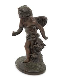 A French Bronze Figure of Eros on a Wood Base