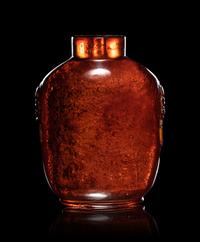 Two Carved Amber Snuff Bottles