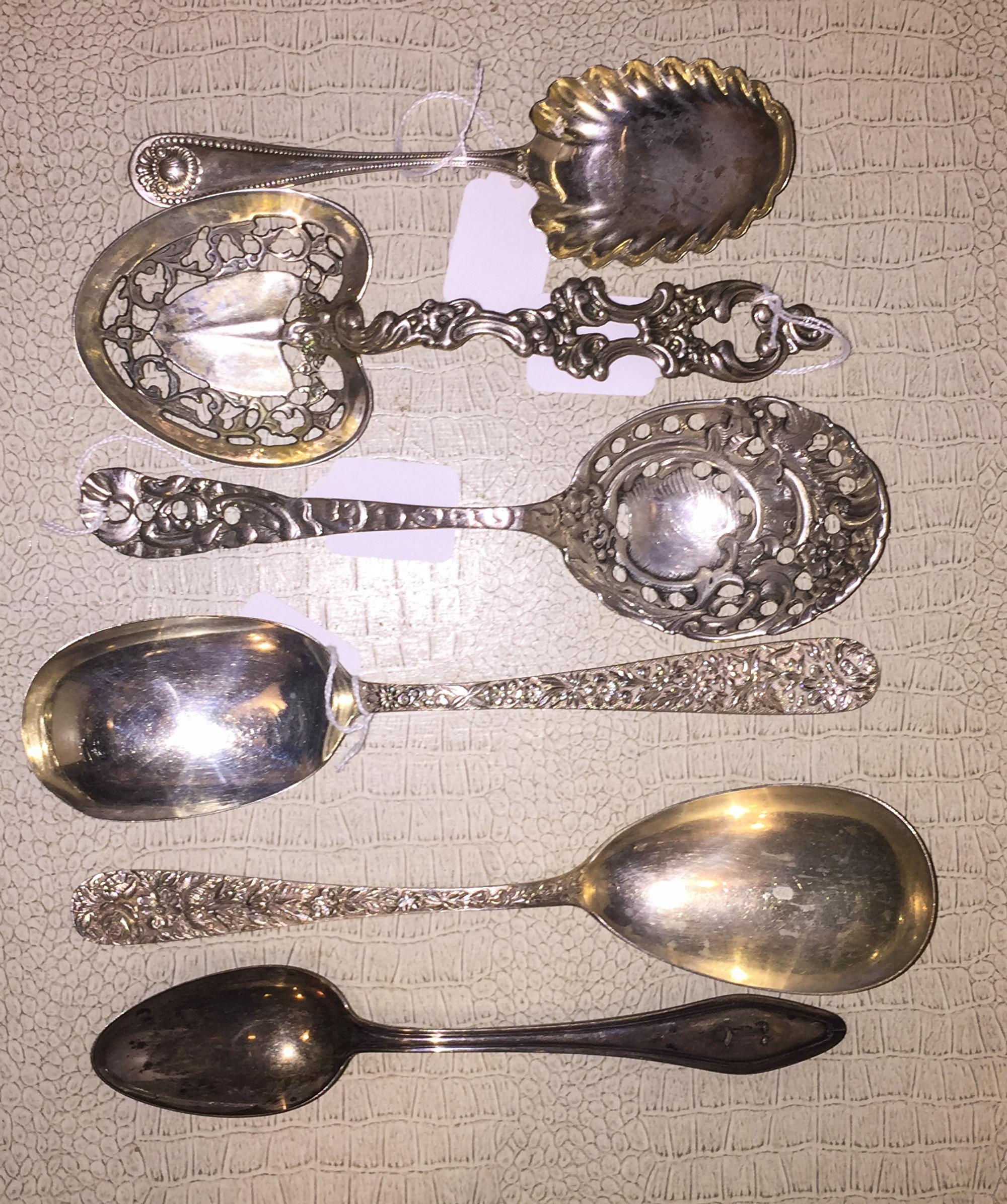 A Group of American Silver Serving Articles, various makers, comprising pierced serving spoons, berry spoons, a ladle and others, toget