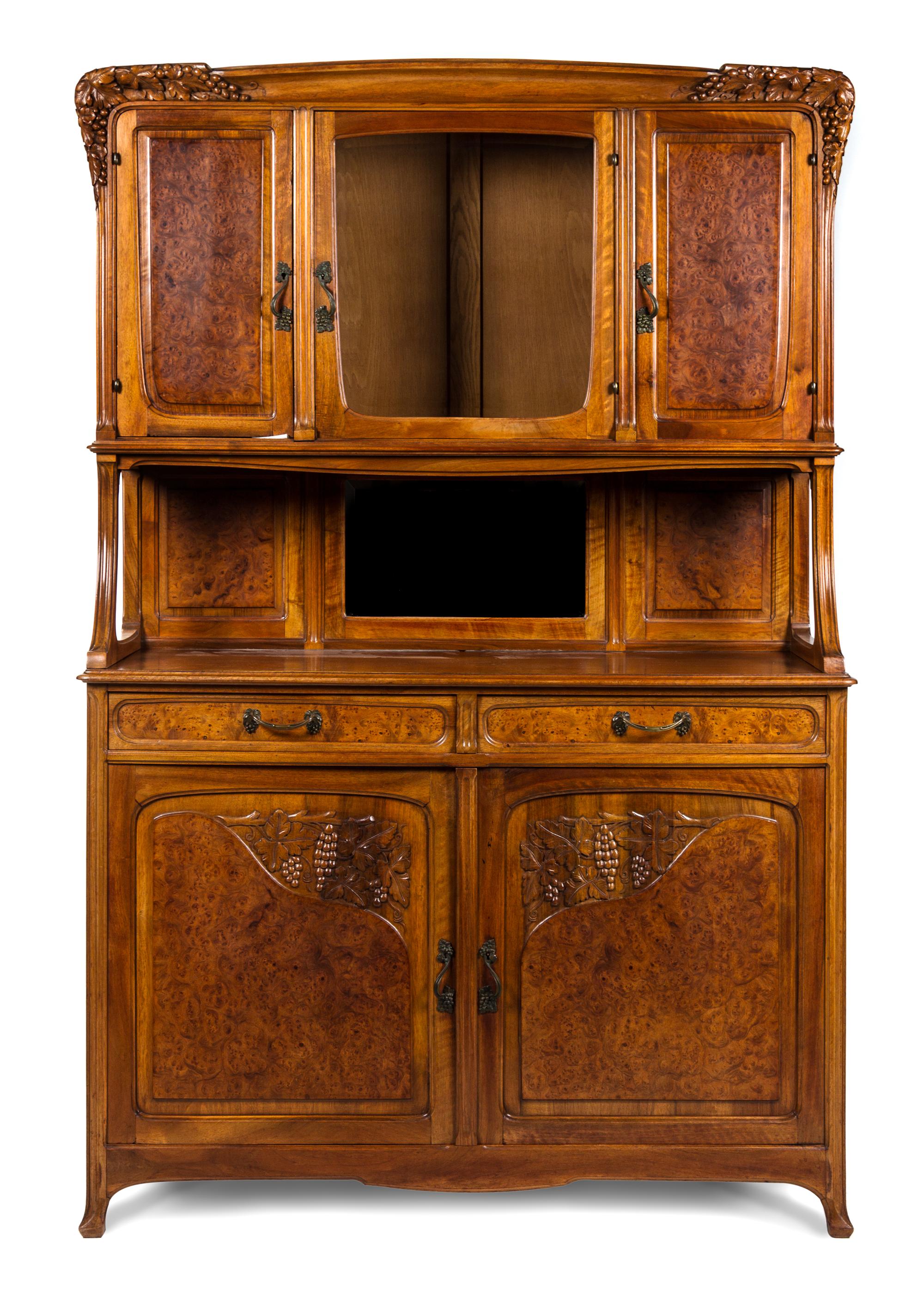 An Art Noveau Buffet A Deux Corps Height 82 x width 54 1/2 x depth 19 1/2 inches.