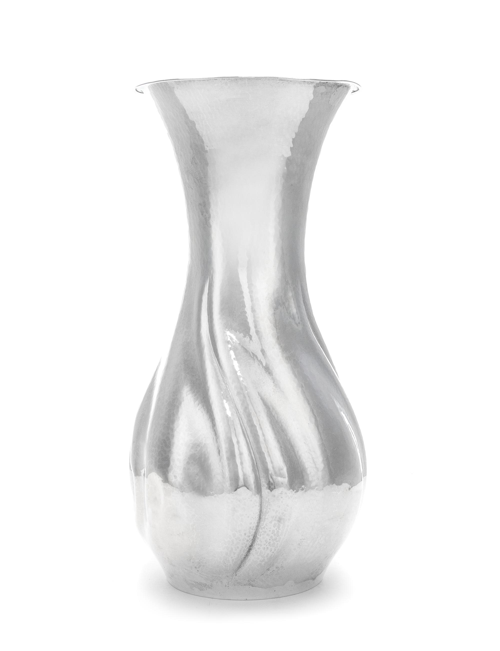 A German Silver Vase, Maker's Mark L&Co., 1920, retailed by Ernst Treusch, Leipzig, of baluster form, having a spot-hammered finish and