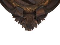 A Pair of Continental Carved Oak and Parcel Gilt Profile Plaques