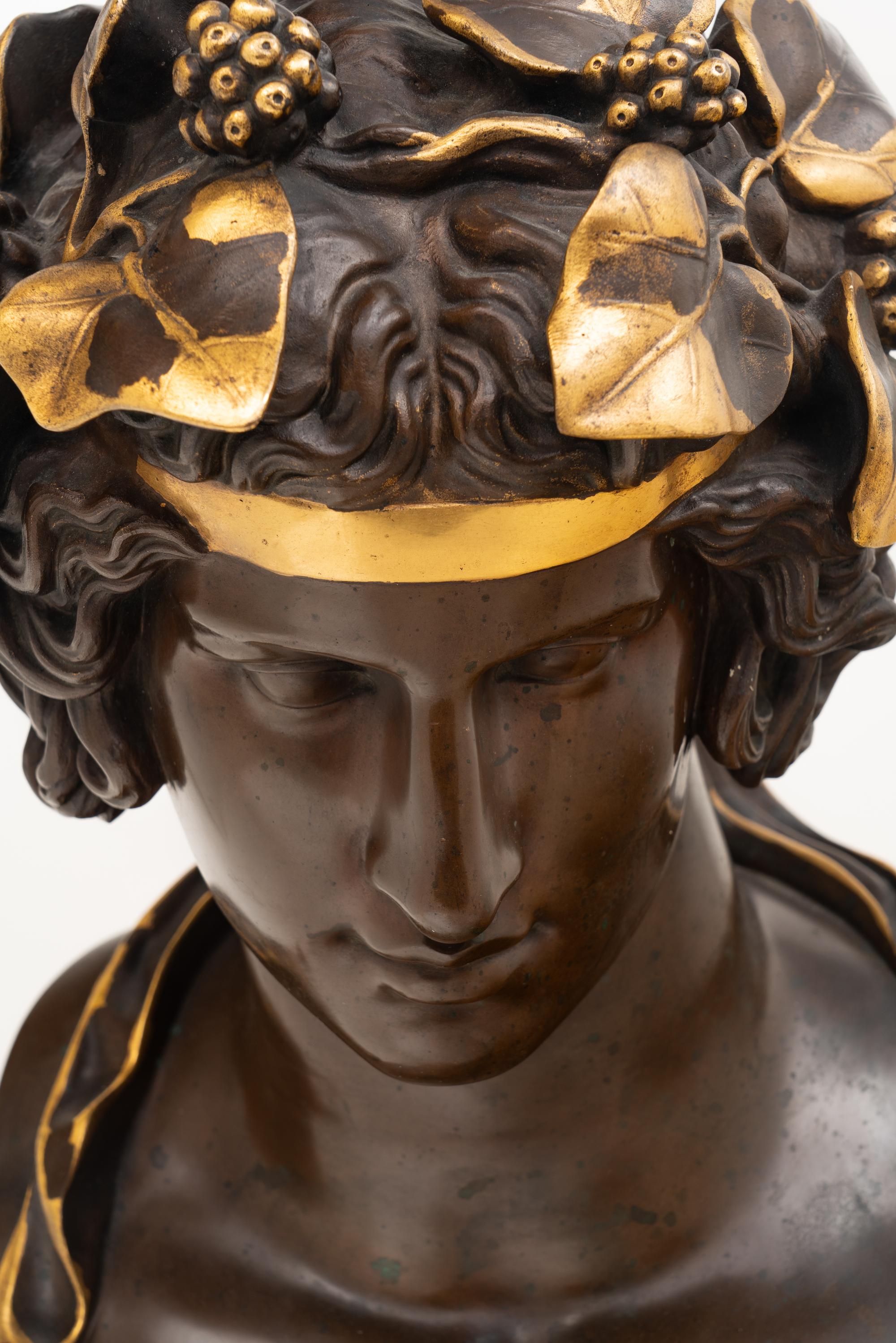 A Bronze and Parcel Gilt Bust of Antinous as Dionysus