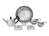 A Collection of Eight English Silver Table Articles