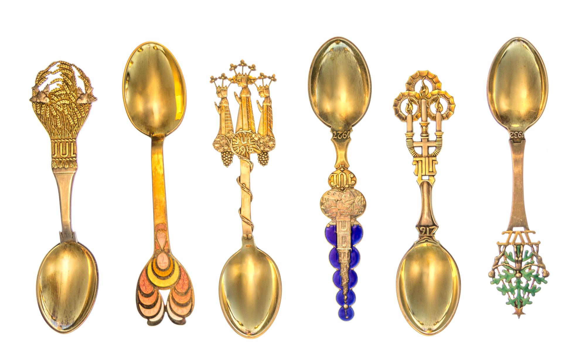 A Collection of Danish Silver-Gilt and Enamel Christmas Spoons, Anton Michelsen, Copenhagen, comprising examples from the years 1912, 1