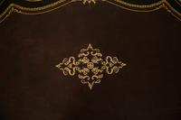 A Napoleon III Style Gilt Bronze Mounted Ebonized Writing Table — LATE 19TH CENTURY