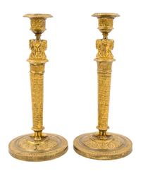 A Pair of Empire Gilt Bronze Candlesticks Height 10 3/4 inches. — EARLY 19TH CENTURY