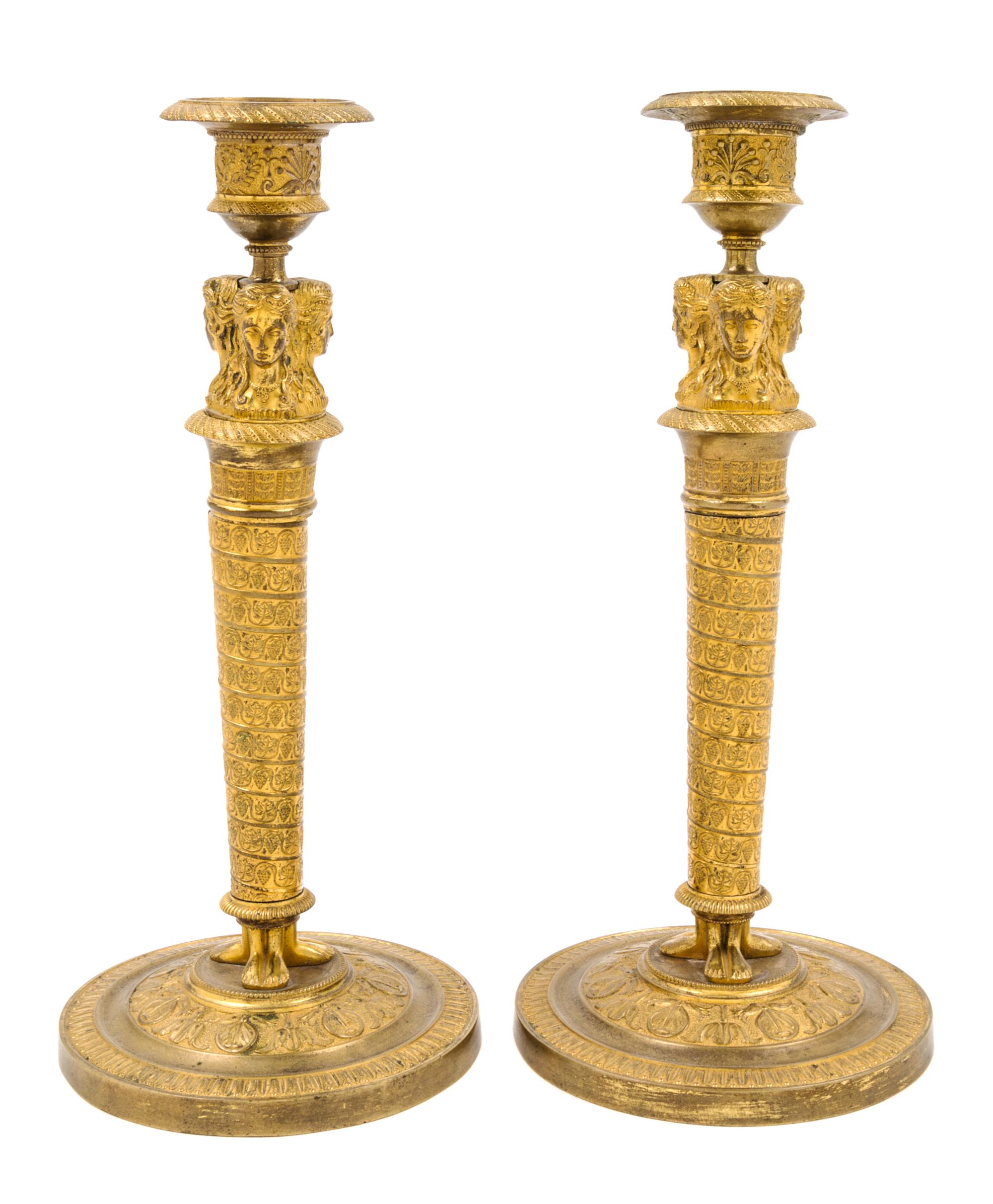 A Pair of Empire Gilt Bronze Candlesticks Height 10 3/4 inches. — EARLY 19TH CENTURY