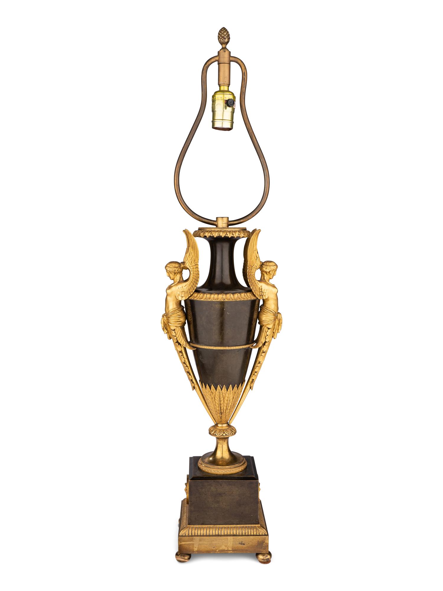 A Pair of Directoire Ormolu and Patinated Bronze Urns