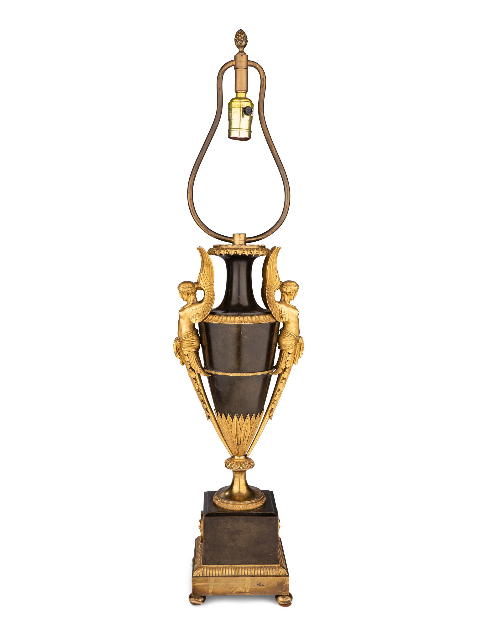 A Pair of Directoire Ormolu and Patinated Bronze Urns