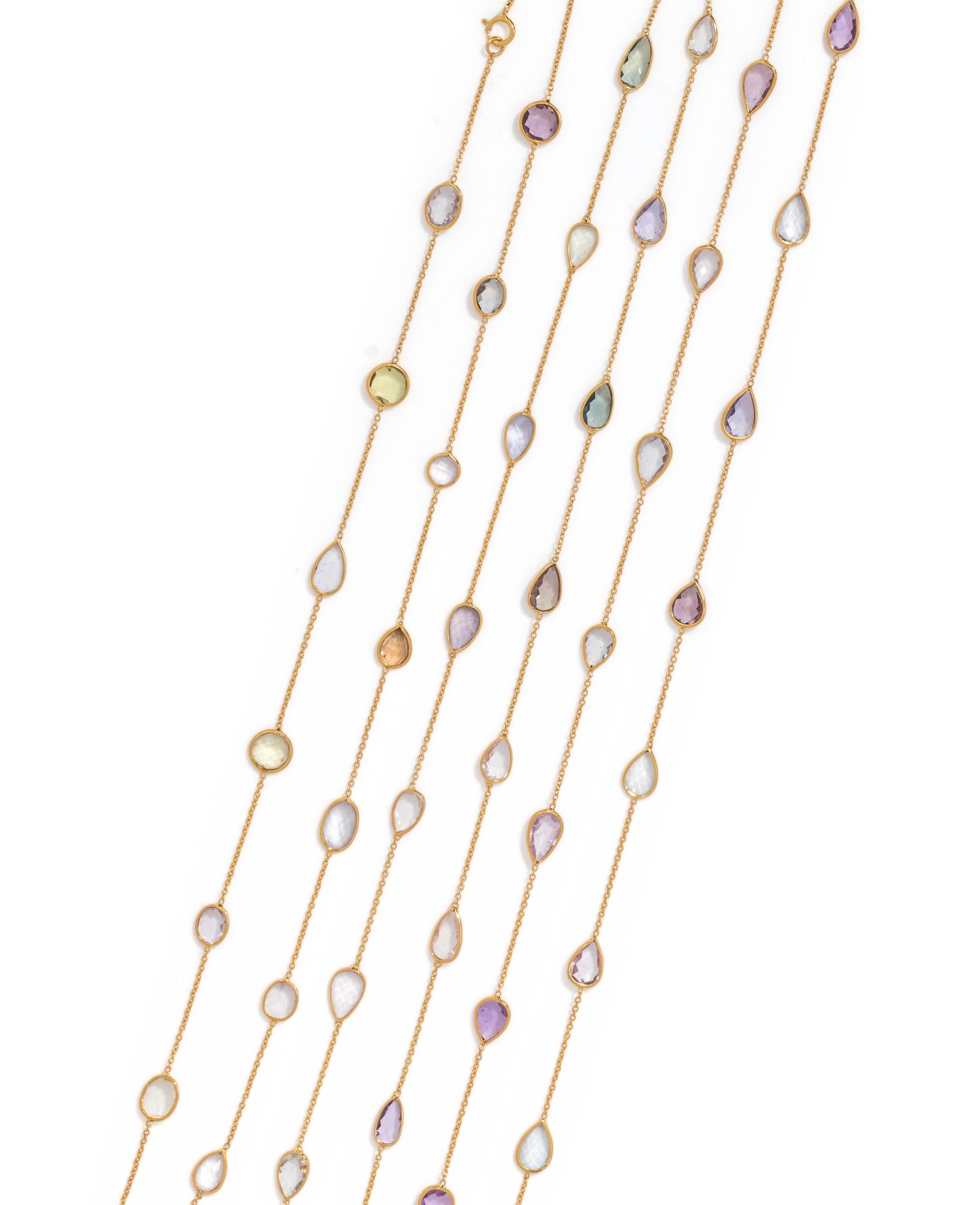 COLLECTION OF YELLOW GOLD AND GEMSTONE NECKLACES