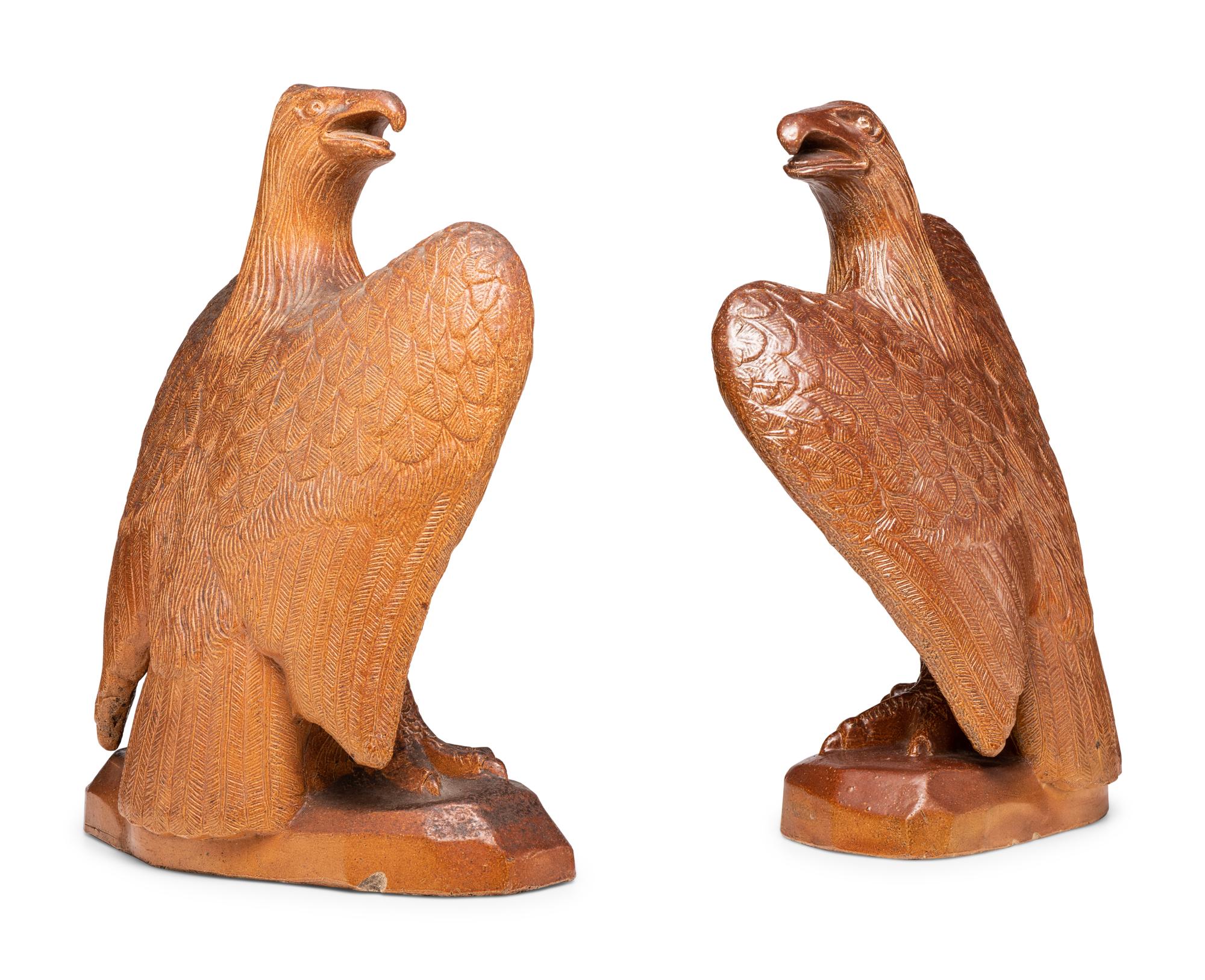 A Pair of Monumental Sewer Tile Eagles