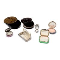 An Assorted Group of Seven Tobacco or Snuff Boxes and Compacts