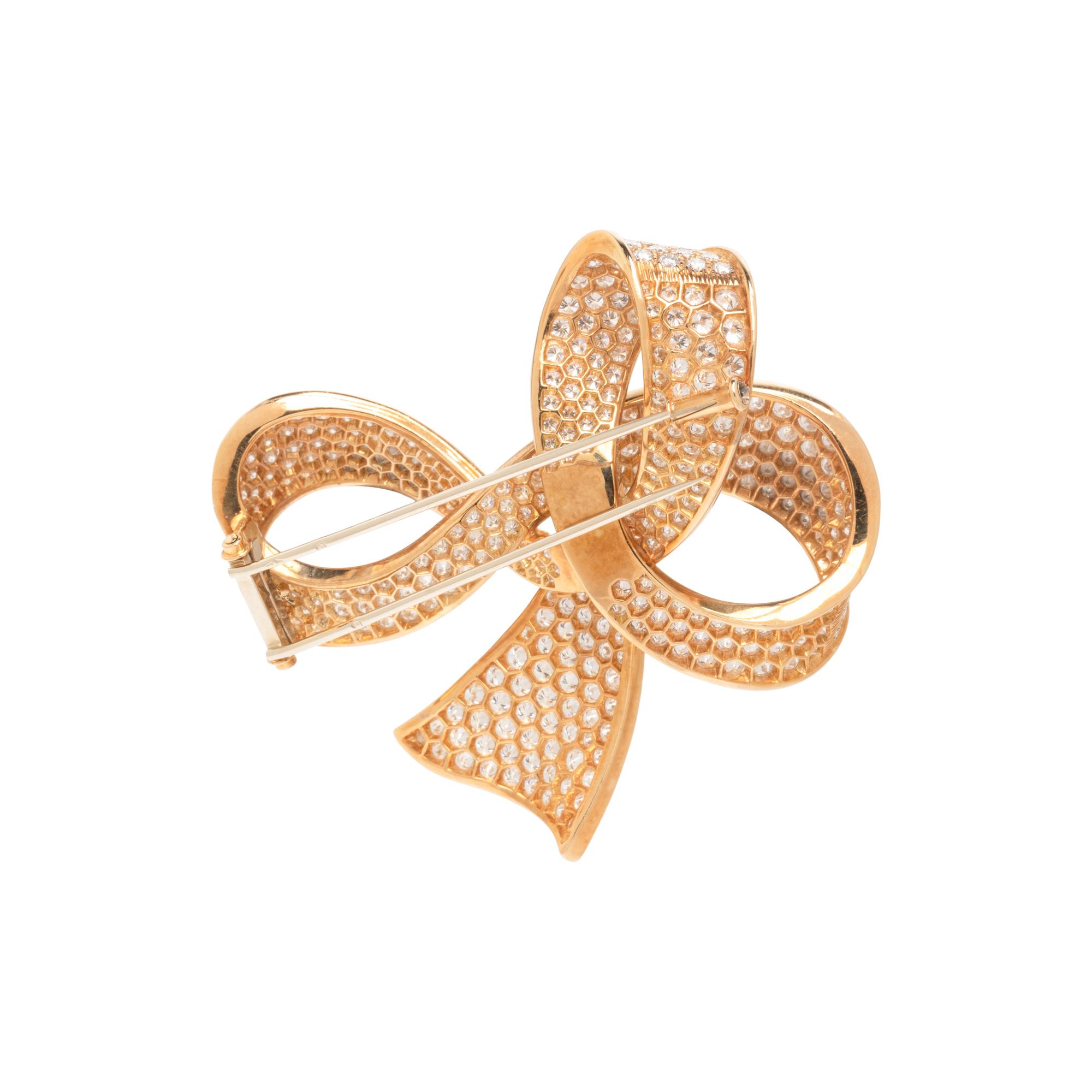 BOUCHERON, YELLOW GOLD AND DIAMOND BOW BROOCH