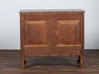 AWAITING DONATION - A Classical Carved Walnut-Veneered Chest of Drawers