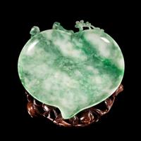 An Apple Green and Celadon Jadeite Peach-Form Ink Palette Length 9 7/8 inches. — 20TH CENTURY
