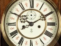 A Continental Walnut Regulator Clock