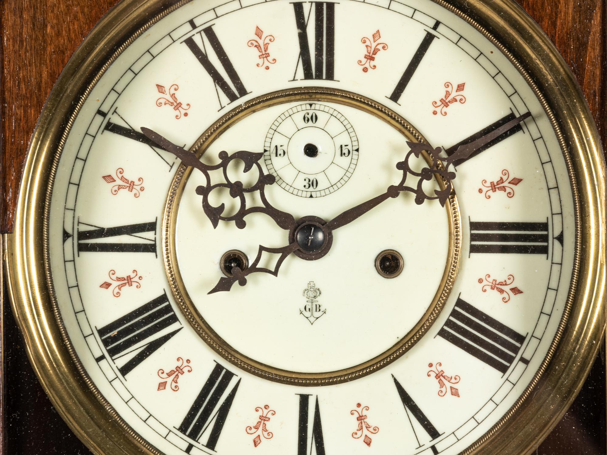 A Continental Walnut Regulator Clock