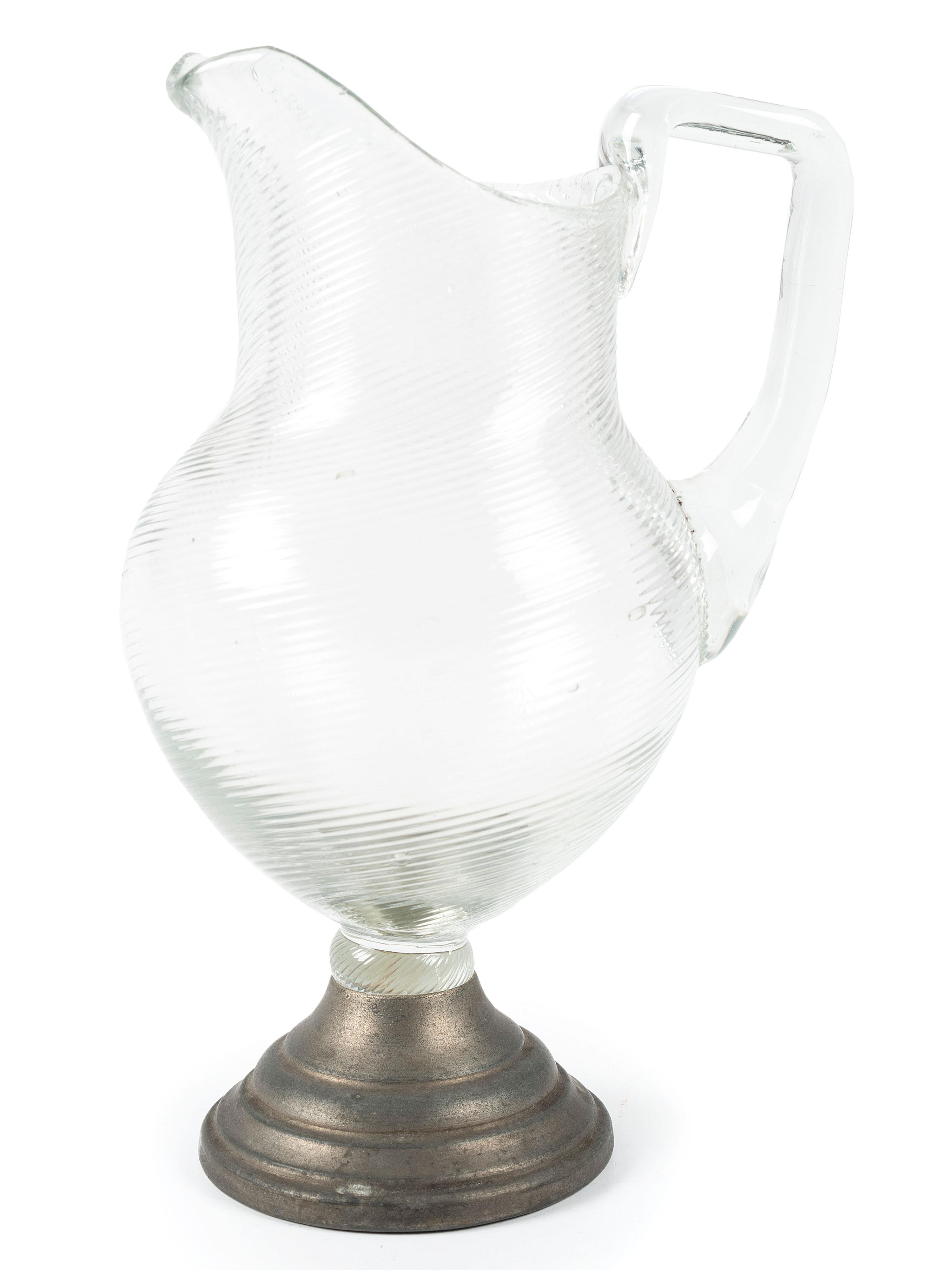 A Ribbed Glass Jug with Pewter Mount
