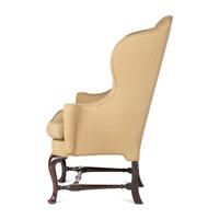 A Queen Anne Turned and Carved Walnut Stretcher Base and Pad Foot Easy Chair