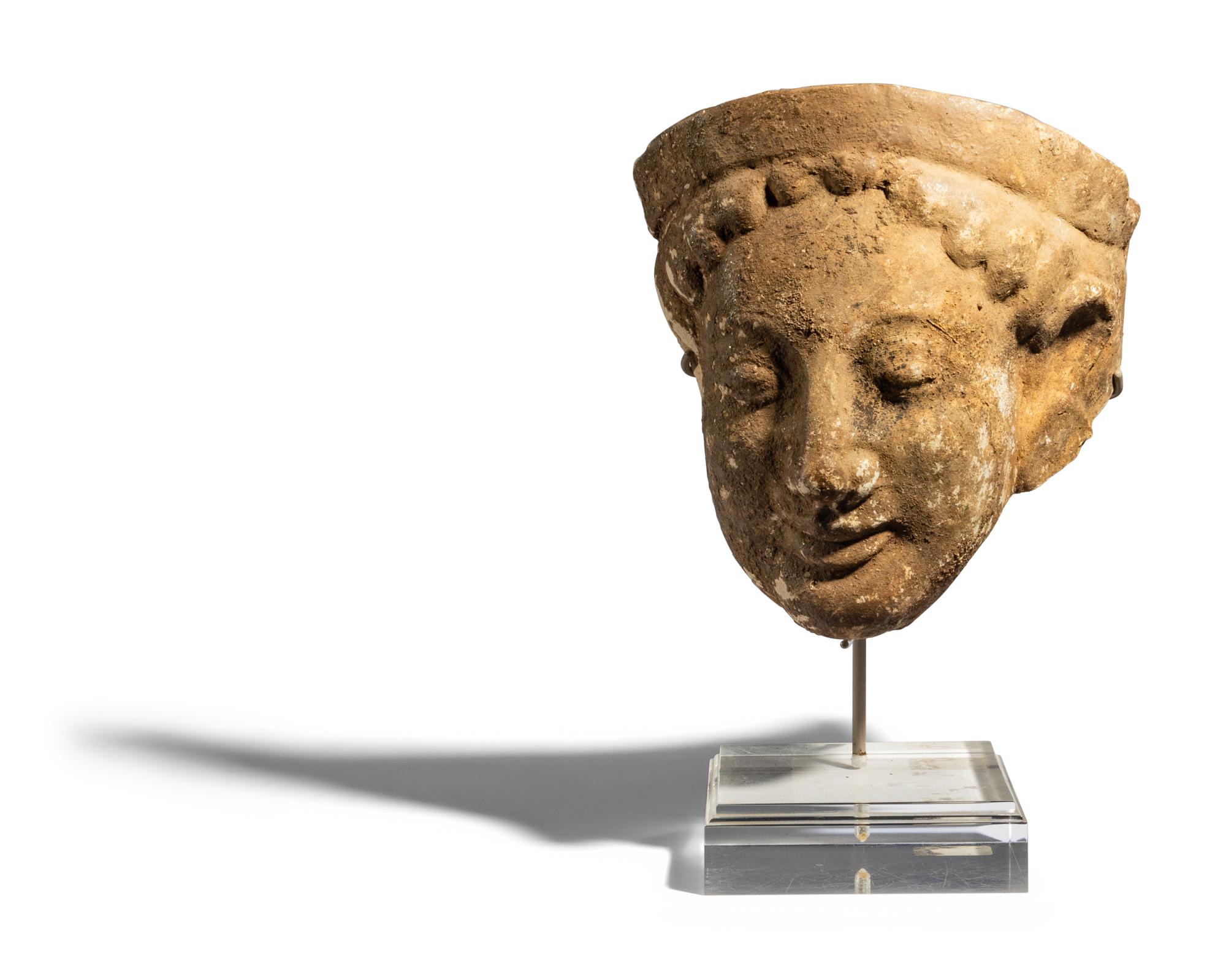 A Greek Terracotta Head with Stephane