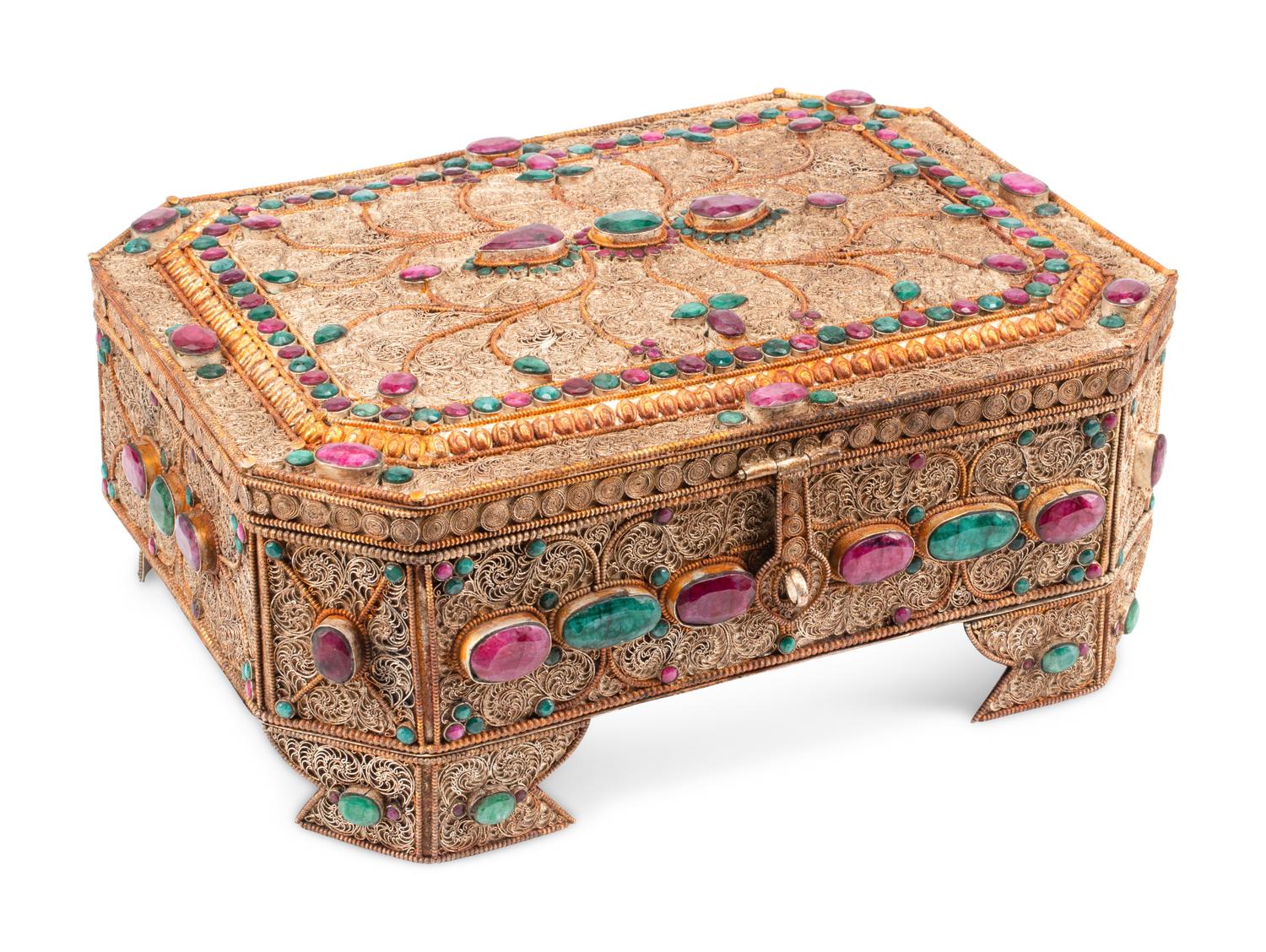 An Emerald and Ruby Mounted Silvered Metal Filigree Box