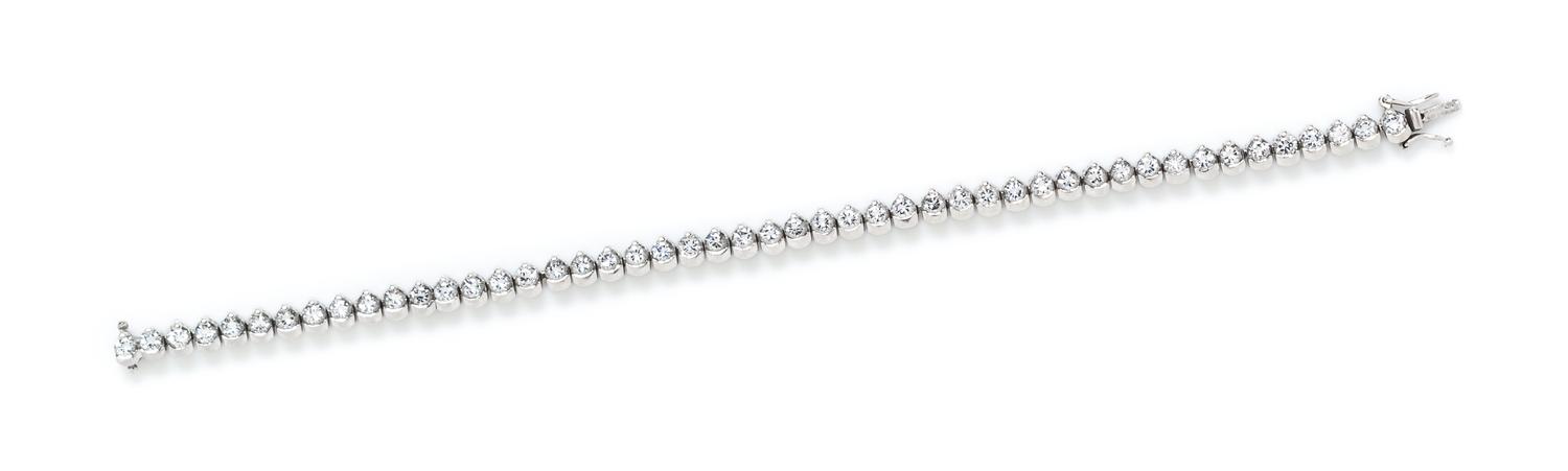 An 18 Karat White Gold and Diamond Line Bracelet, 17.70 dwts.