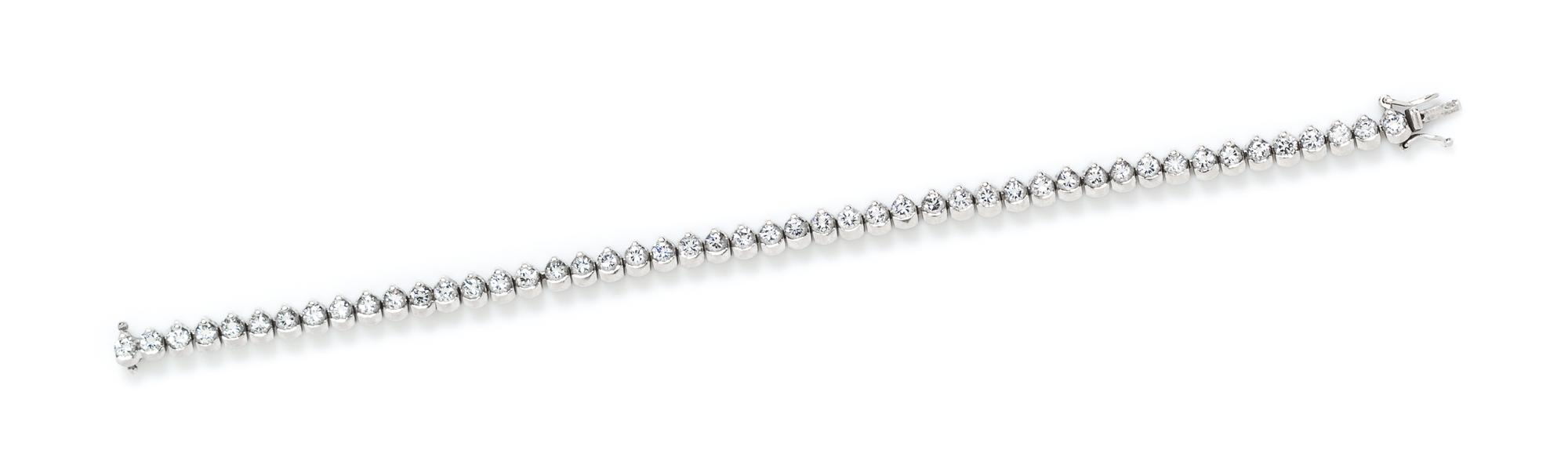 An 18 Karat White Gold and Diamond Line Bracelet, 17.70 dwts.