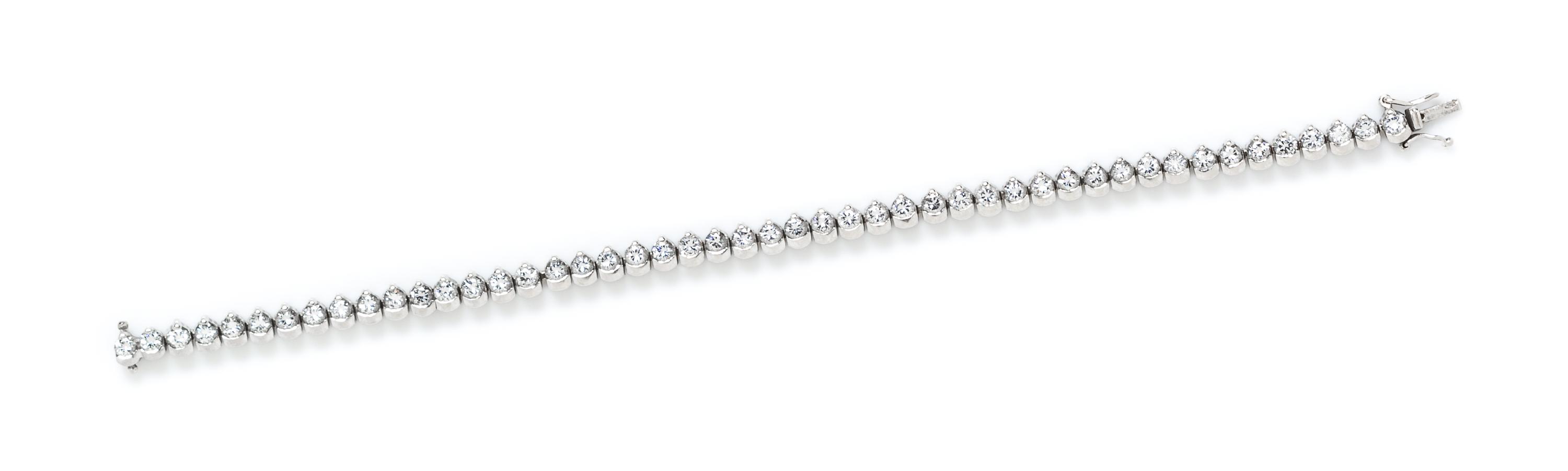 An 18 Karat White Gold and Diamond Line Bracelet, 17.70 dwts.