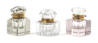 Three Brass Mounted Glass Inkwells Height of tallest 3 5/8 inches.