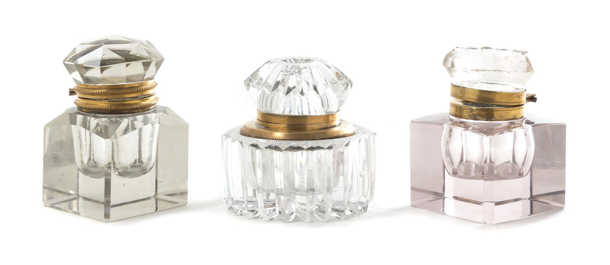 Three Brass Mounted Glass Inkwells Height of tallest 3 5/8 inches.