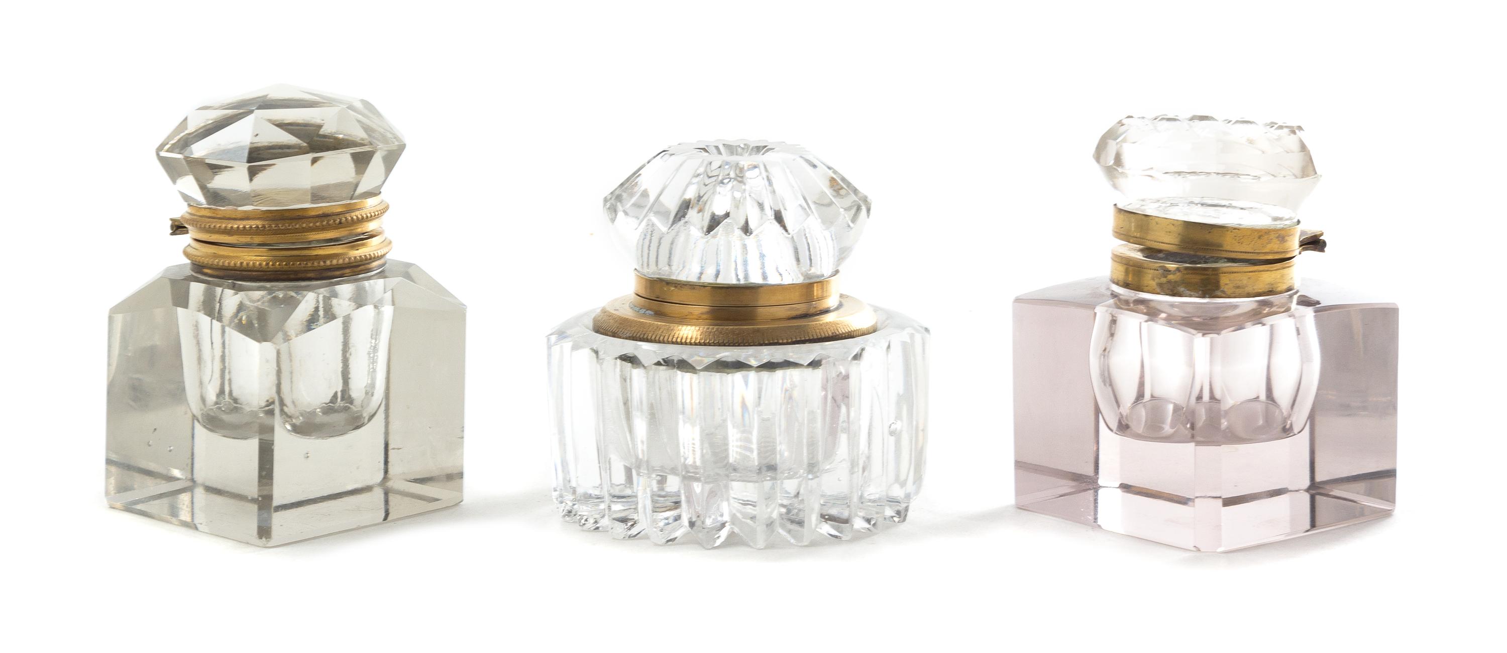 Three Brass Mounted Glass Inkwells Height of tallest 3 5/8 inches.