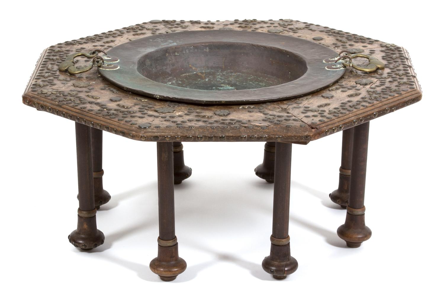 A Spanish Carved Walnut and Copper Inset Brazier Table Height 14 x diameter 33 inches. — POSSIBLY NORTHERN SPAIN, 18TH/19TH CENTURY