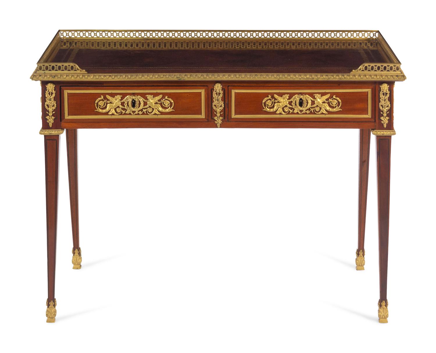 A Louis XVI Style Gilt Bronze Mounted Mahogany Table à Écrire